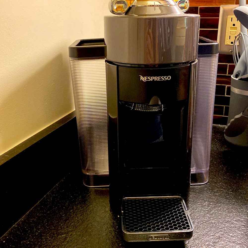 Almost brand new nepresso maker - with 4 plus boxes of pods